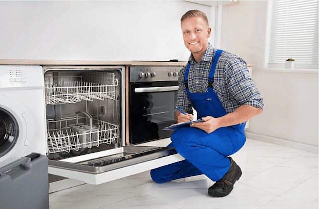 smiling appliance repairman in newton